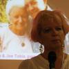 Alison, daughter of Betty Catharine, with the slideshow in the background